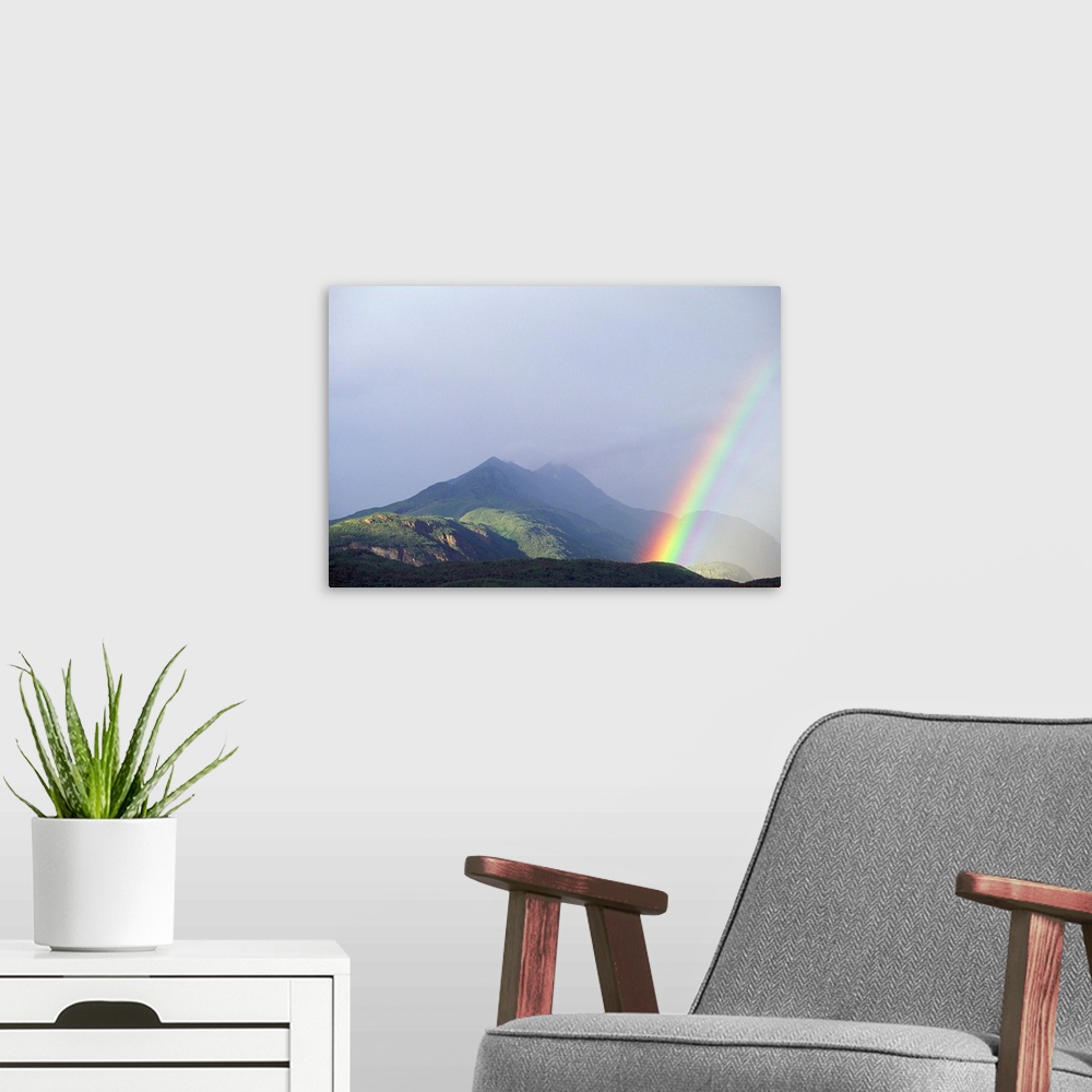 A modern room featuring A rainbow forms over the Chugach Mountain Range near the Matanuska Glacier.