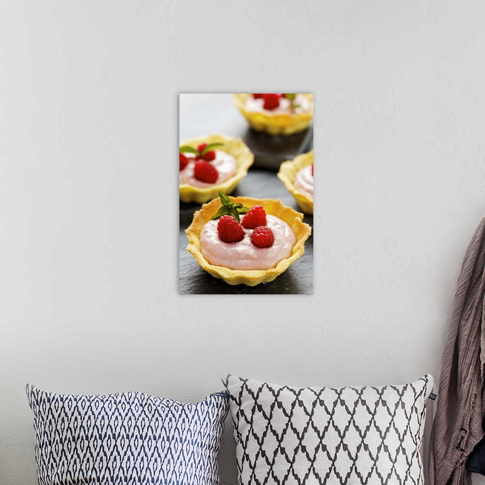 A bohemian room featuring Raspberry tarts, close-up