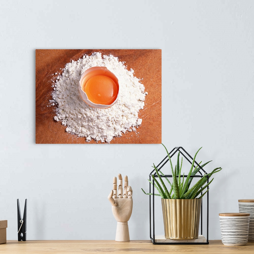 A bohemian room featuring Raw egg sitting on wheat flour