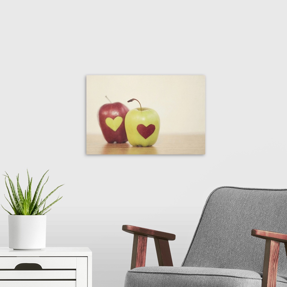 A modern room featuring Red and green apple with heart shape.