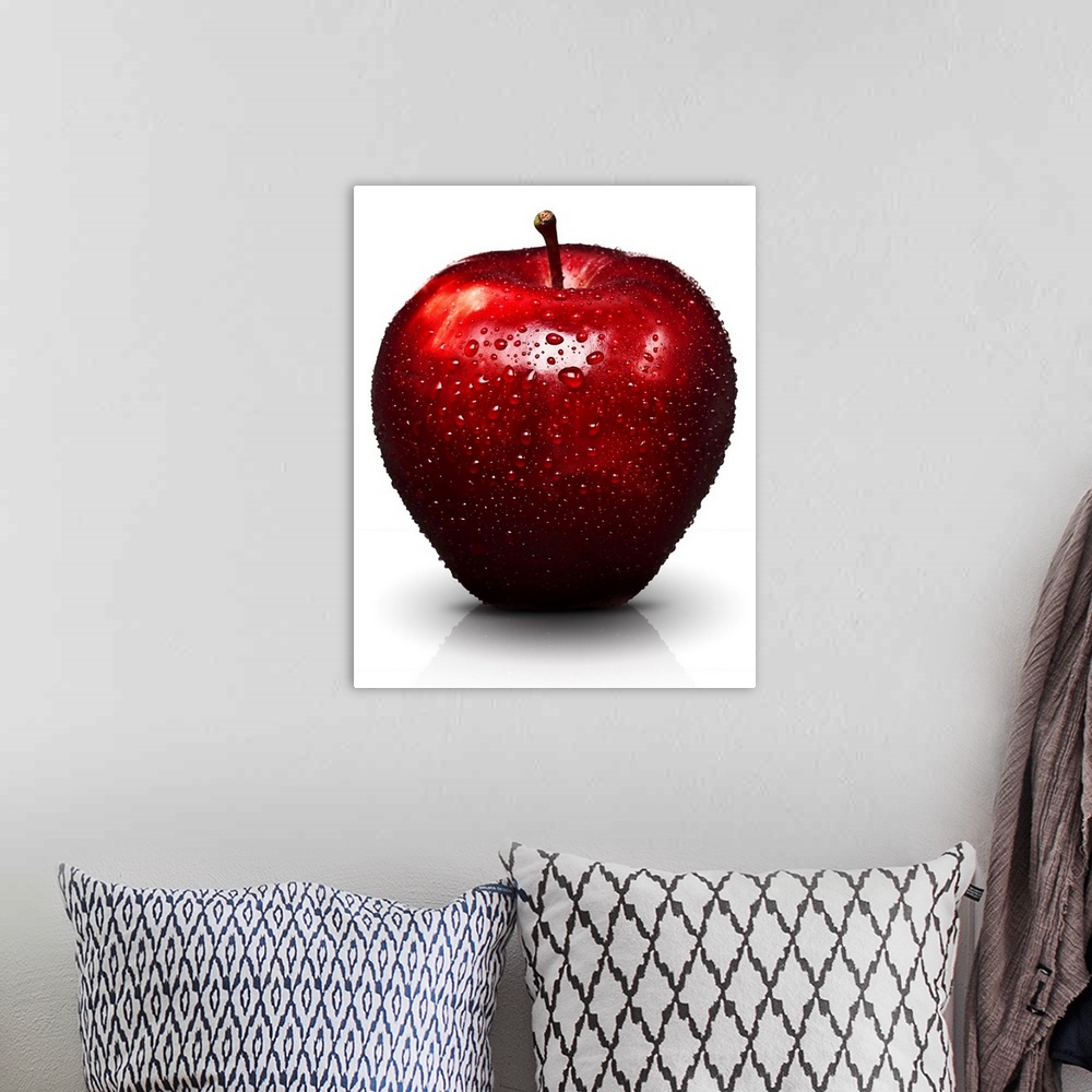 A bohemian room featuring Red apple with water droplets, on white background, cut out