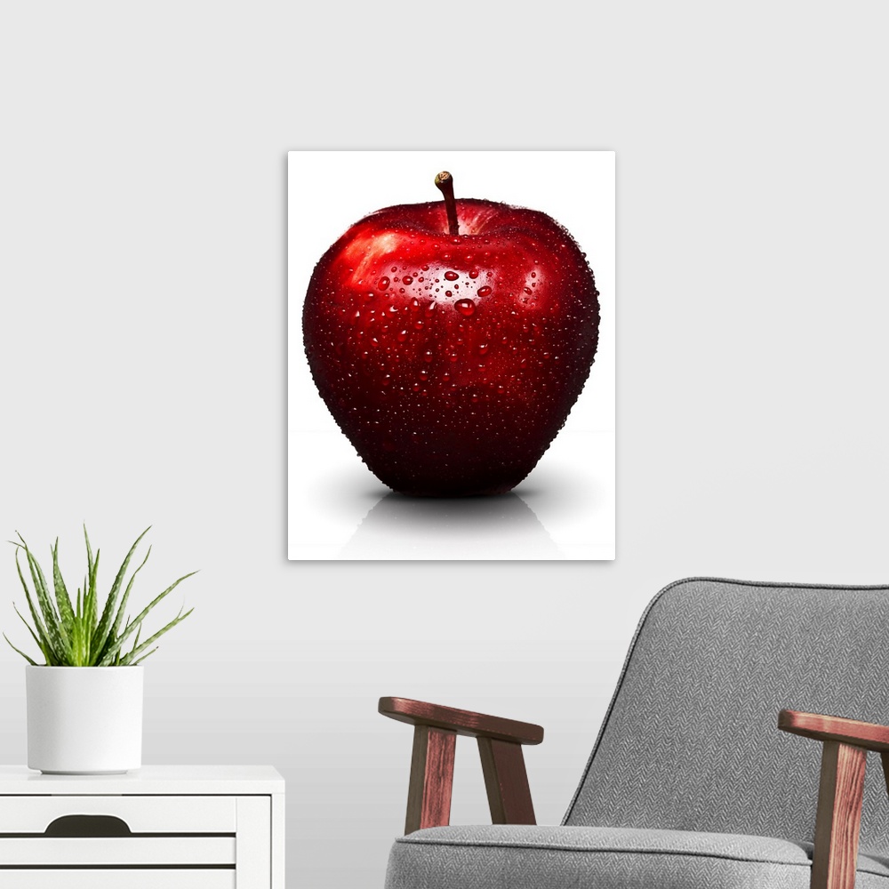 A modern room featuring Red apple with water droplets, on white background, cut out