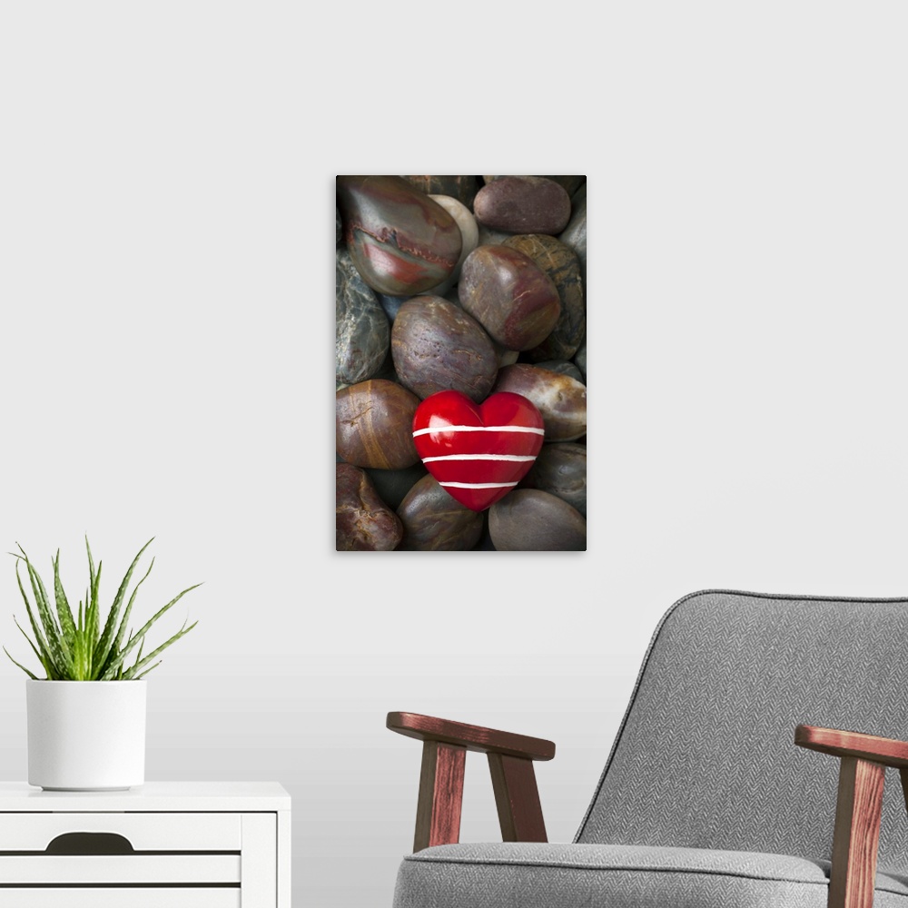 A modern room featuring Red heart among stones