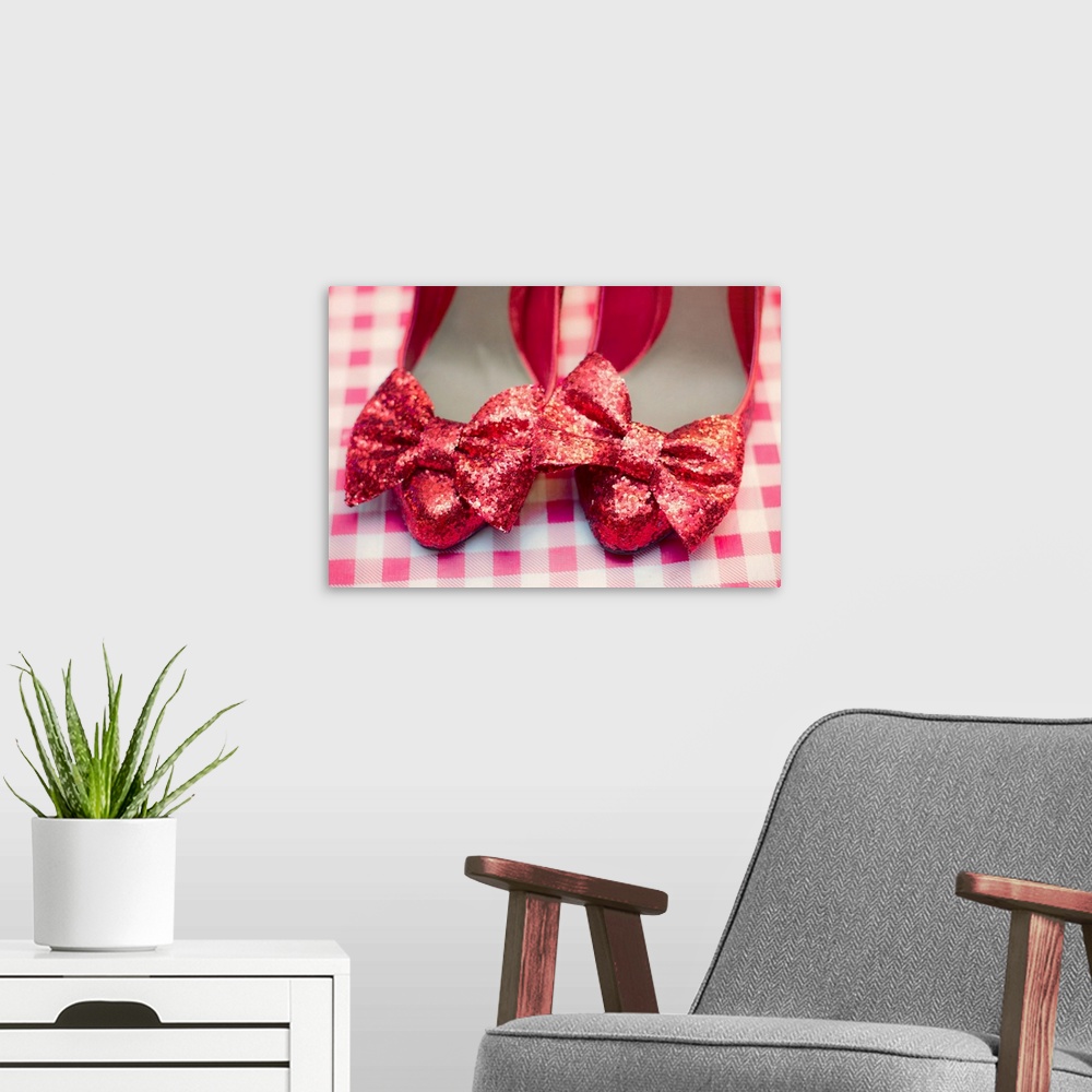A modern room featuring Red shoes with glitter and bows