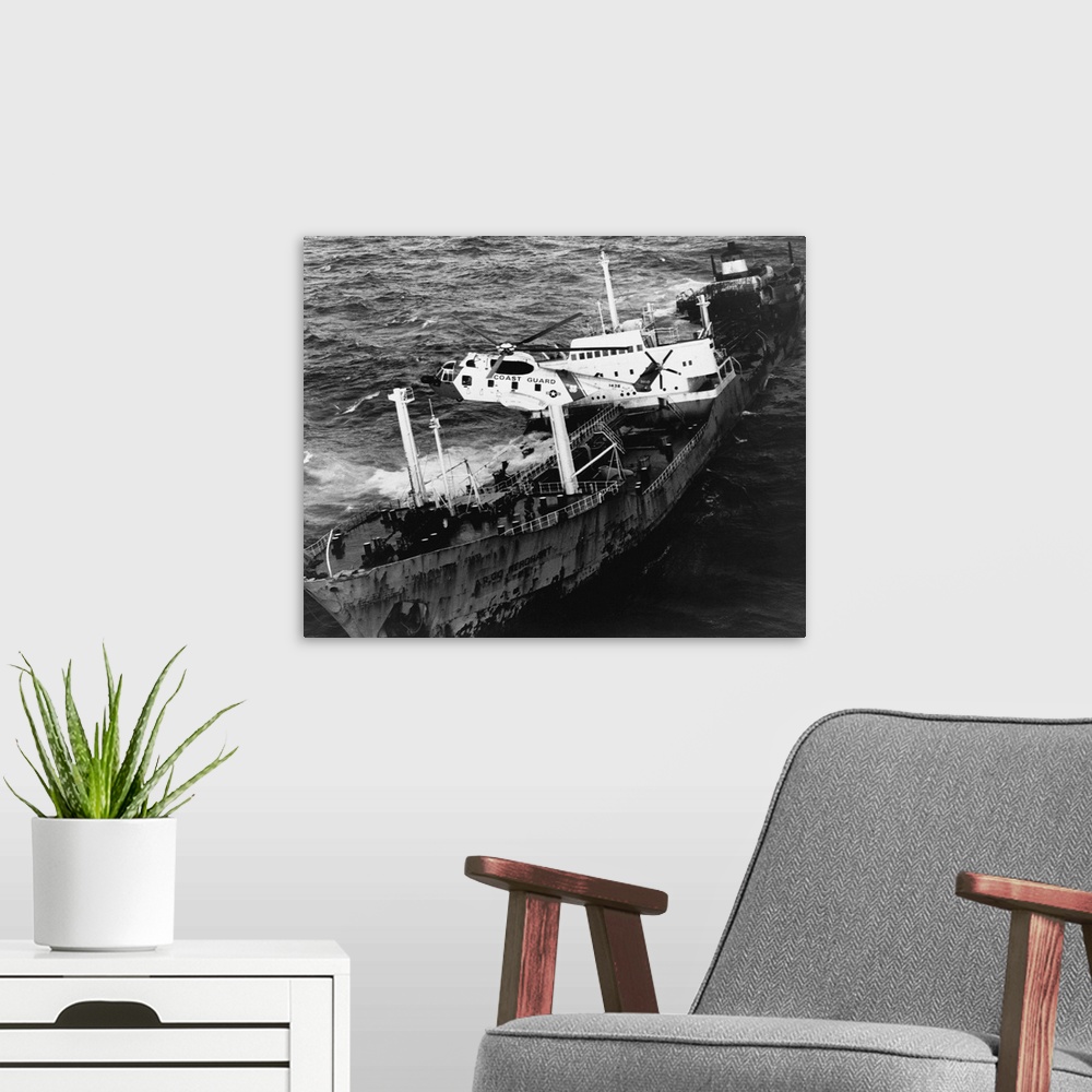 A modern room featuring A Sikorsky HH-3F Pelican hovers over the Argo Merchant oil tanker during a rescue operation. The ...