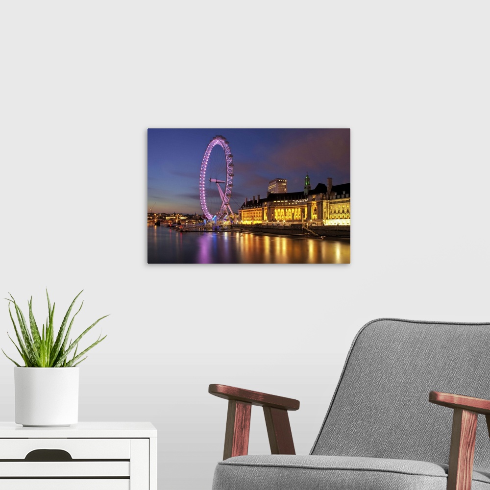 A modern room featuring River Thames at Westminster, towards the iconic London Eye, in the city of London.