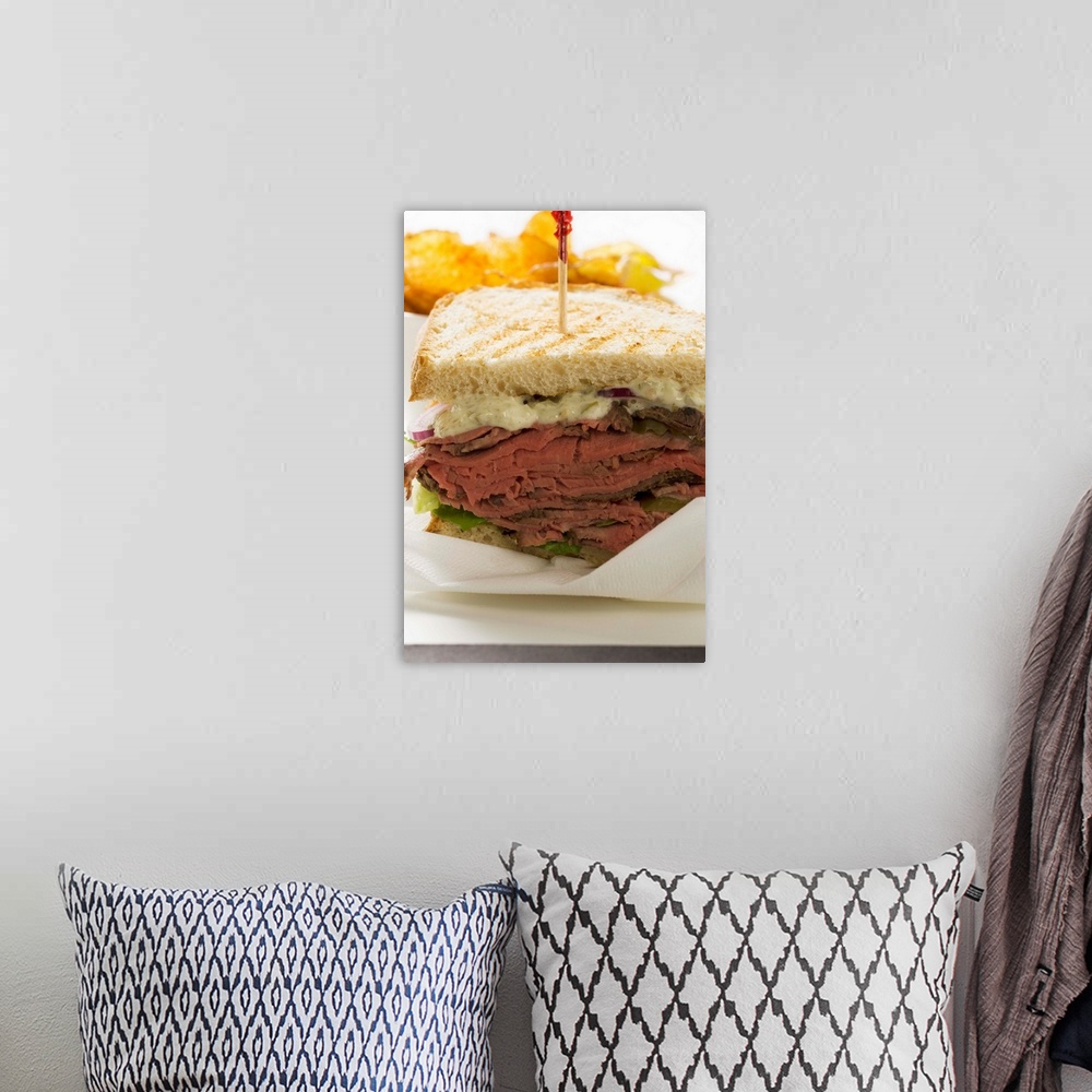A bohemian room featuring Roast beef sandwich with crisps