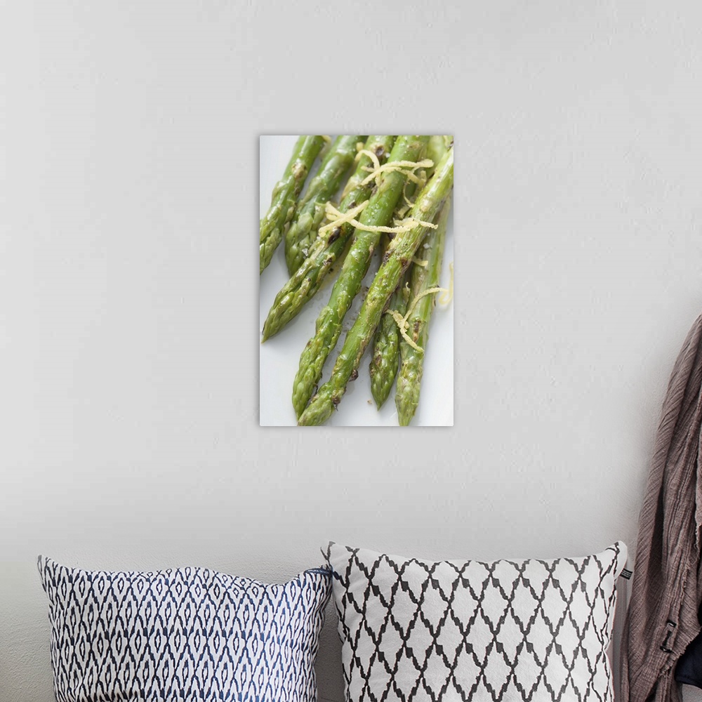 A bohemian room featuring Roasted green asparagus with lemon zest, overhead view
