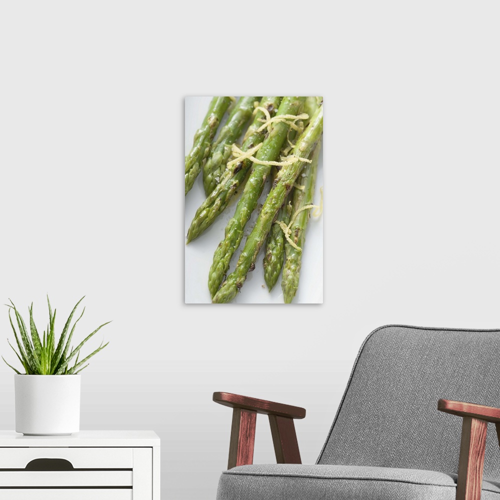 A modern room featuring Roasted green asparagus with lemon zest, overhead view