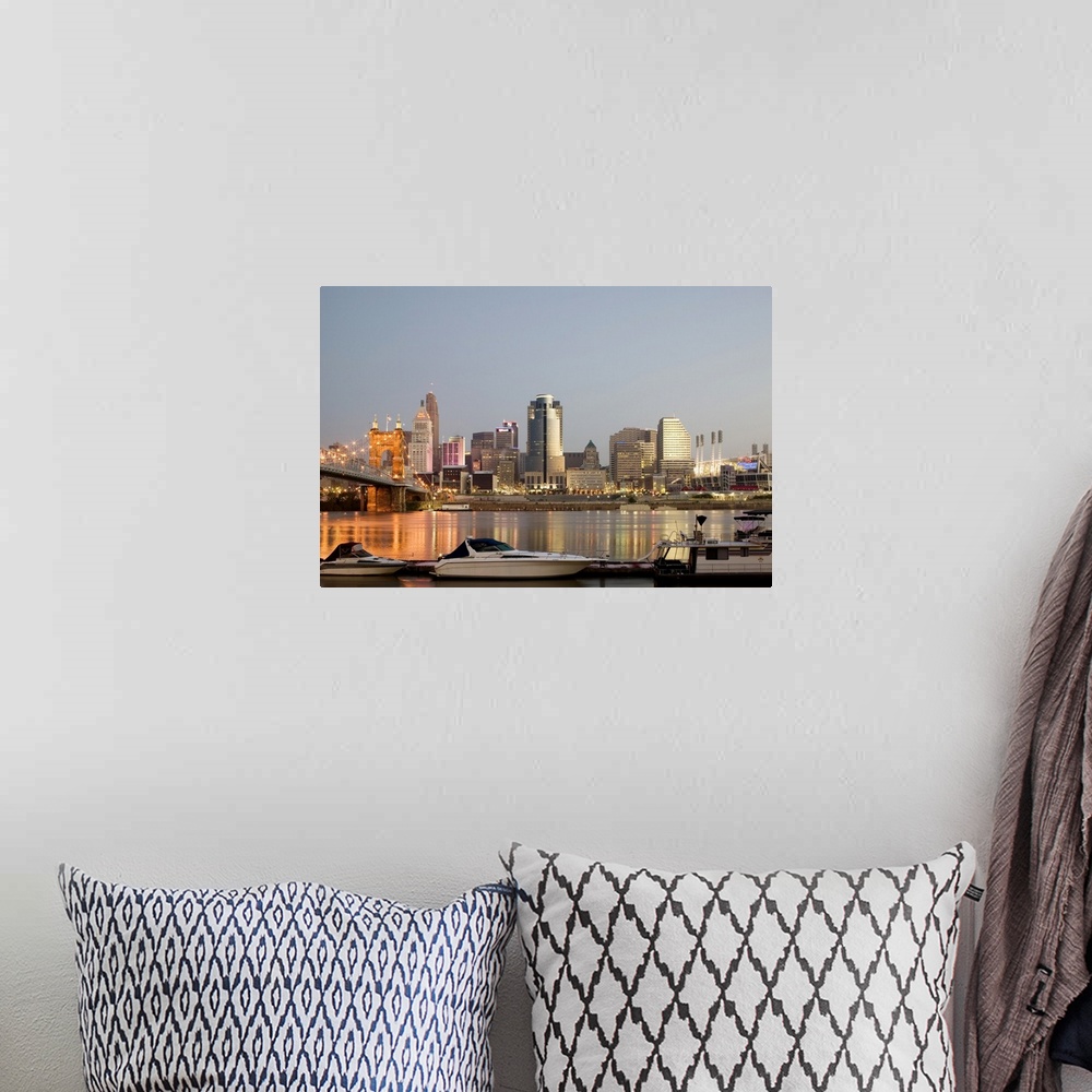 A bohemian room featuring Roebling Suspension Bridge (b.1876) over the Ohio River and skyline
