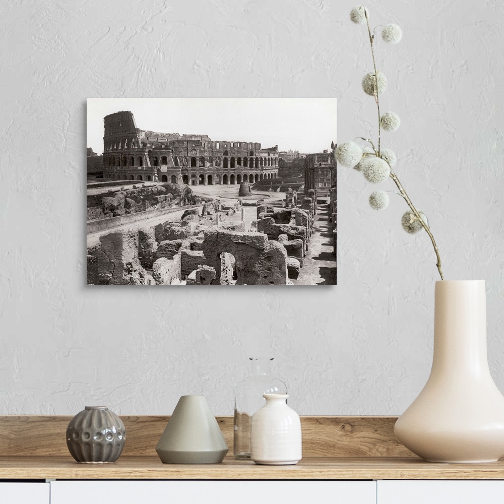 A farmhouse room featuring Rome, Italy: A general view of the ruins surrounding the ancient Colosseum and the Colosseum itse...