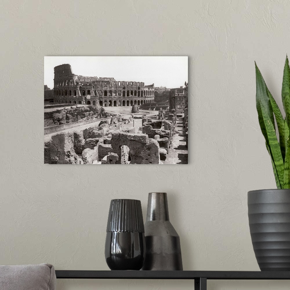 A modern room featuring Rome, Italy: A general view of the ruins surrounding the ancient Colosseum and the Colosseum itse...