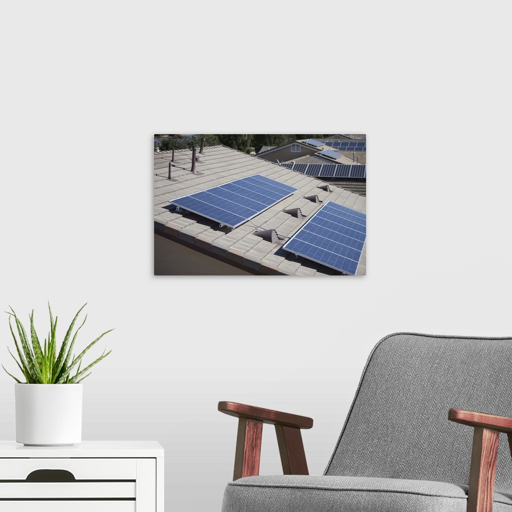 A modern room featuring Roof tops with some solar panelling on