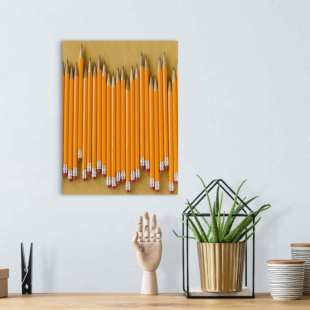 A bohemian room featuring Row of pencils on table