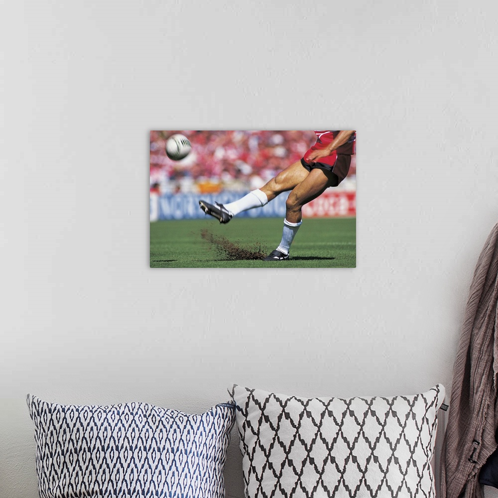 A bohemian room featuring Rugby Player Kicking the Ball