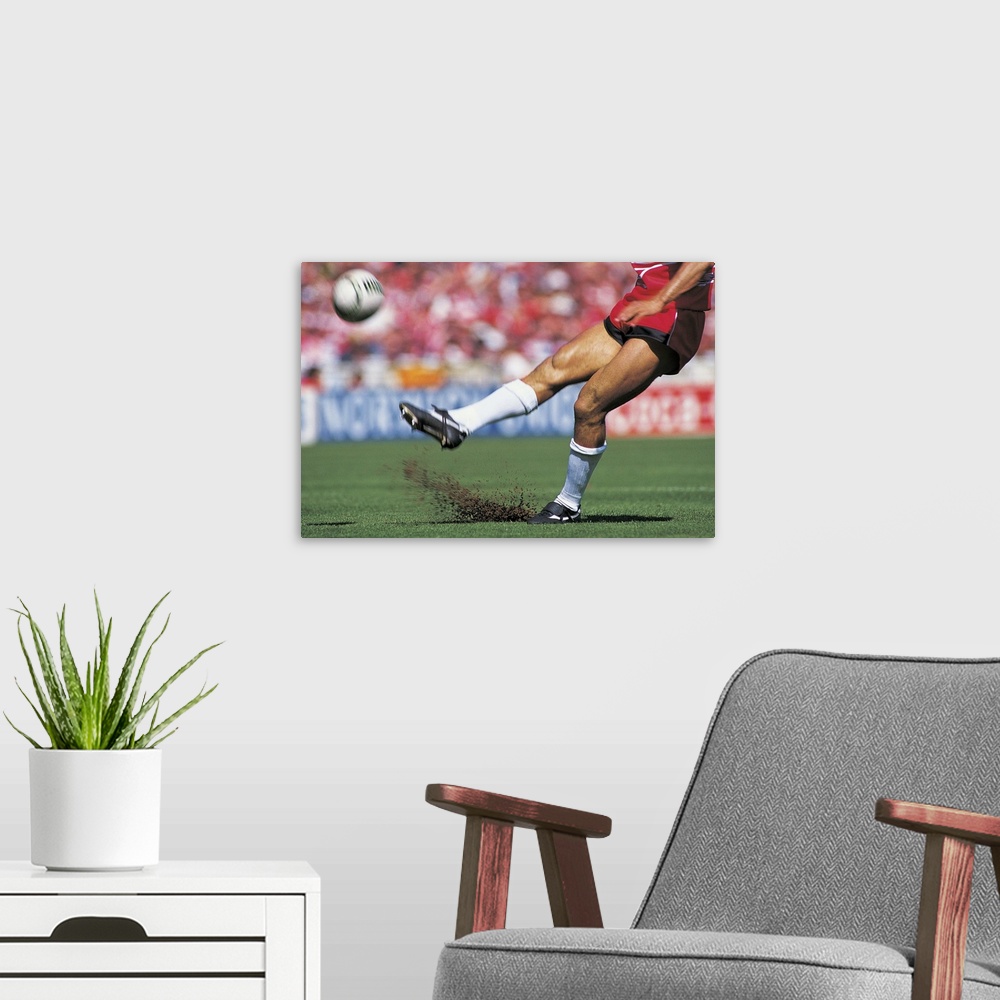 A modern room featuring Rugby Player Kicking the Ball