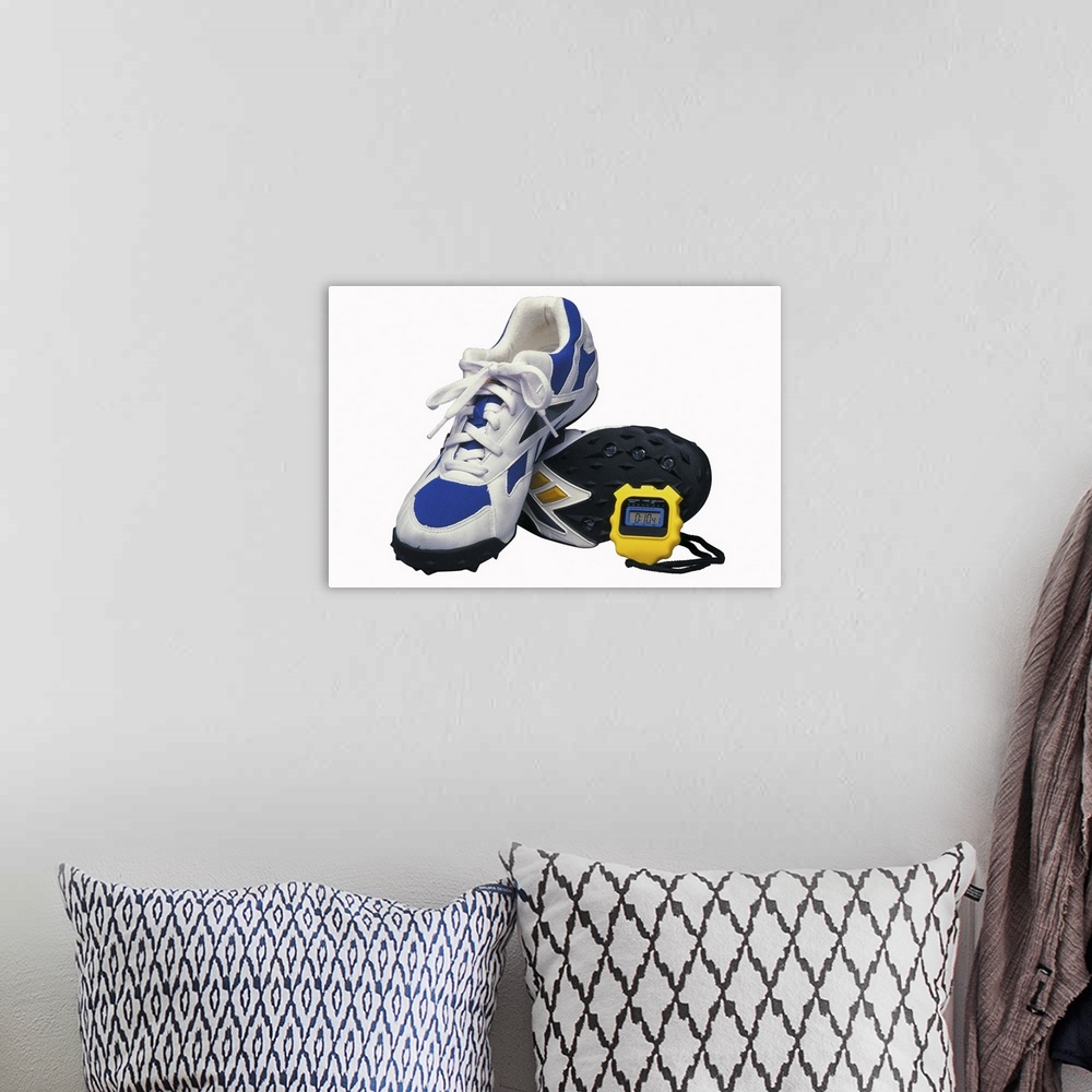 A bohemian room featuring Running shoes and stopwatch