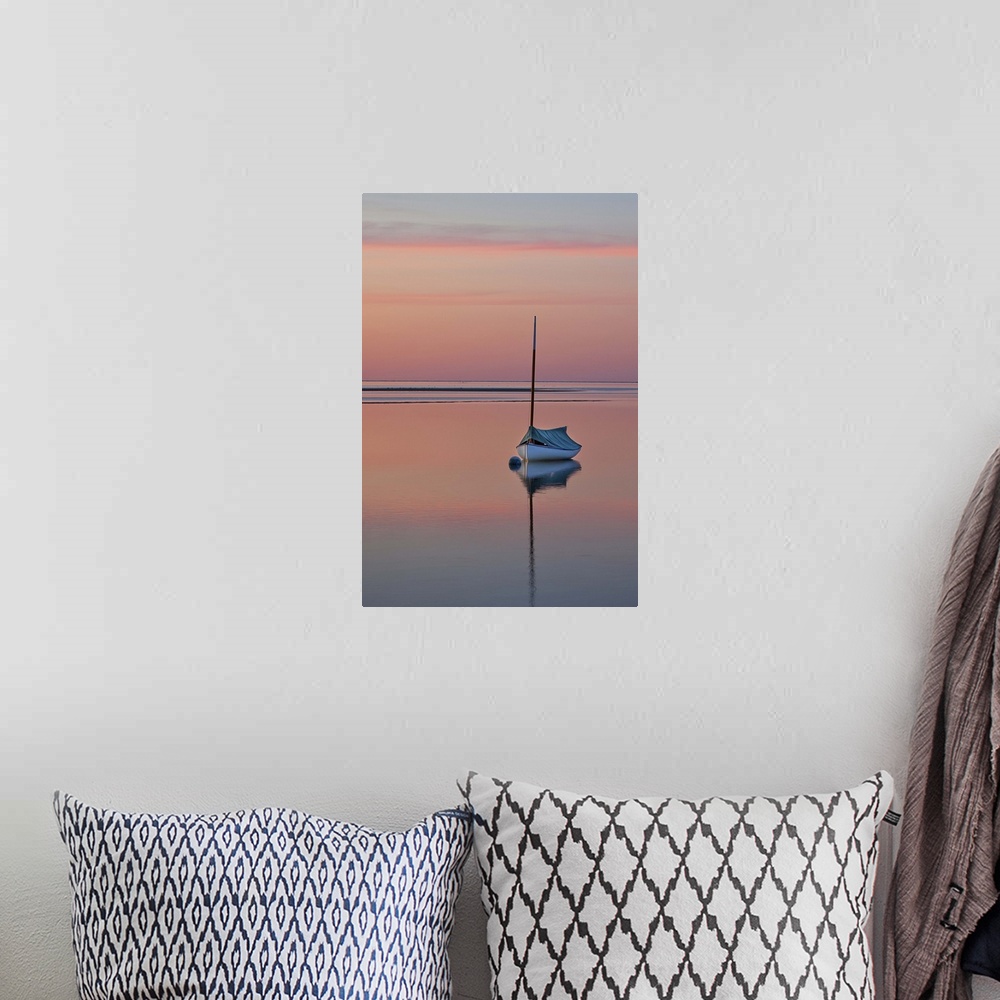 A bohemian room featuring Sailboat and buoy at sunset.