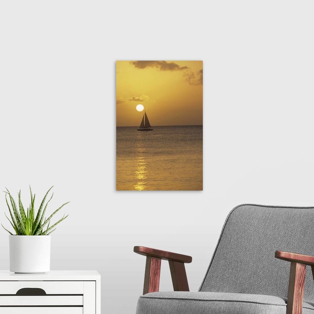 A modern room featuring Sailboat at sunset