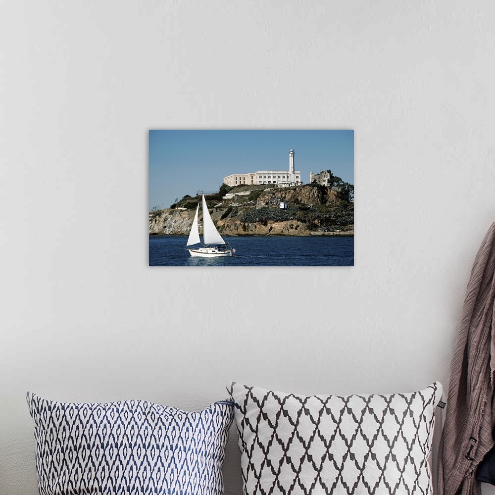 A bohemian room featuring Sailboat Floating by Alcatraz
