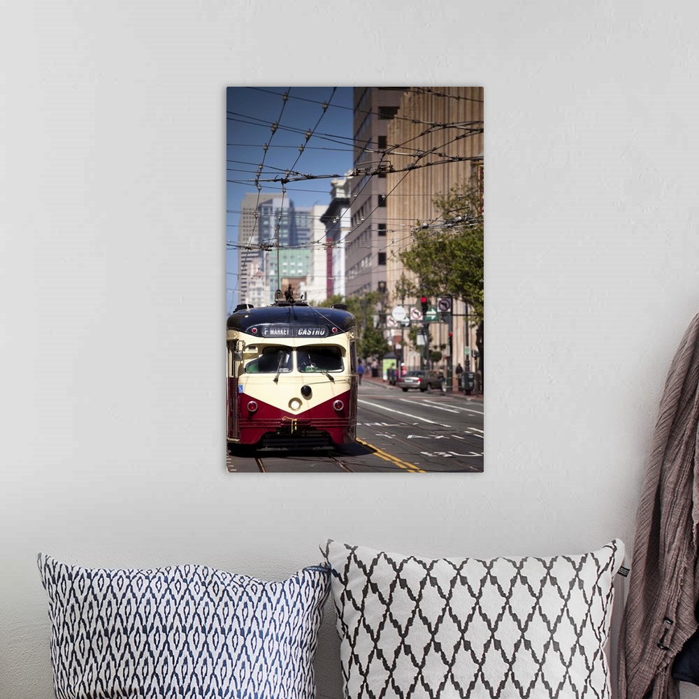 A bohemian room featuring An F-line historic streetcar rumbles down Market Street heading West towards the Castro district ...