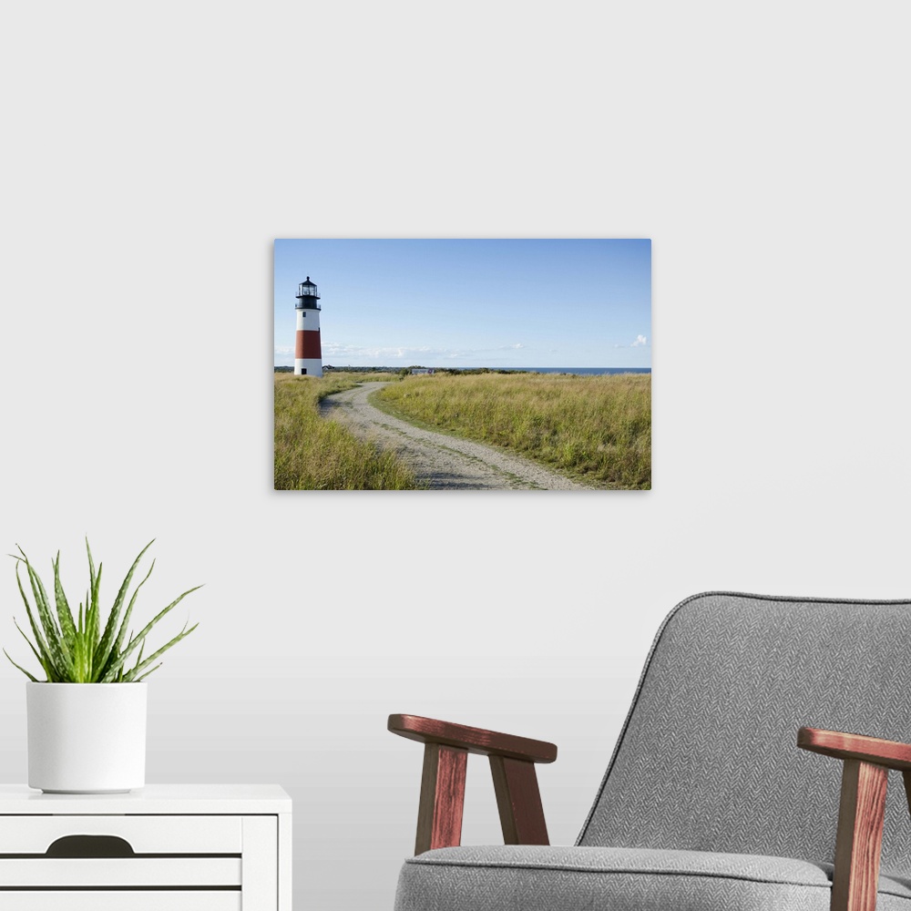 A modern room featuring Sankaty Head Lighthouse and Atlantic Ocean, Nantucket Island, Massachusetts USA.