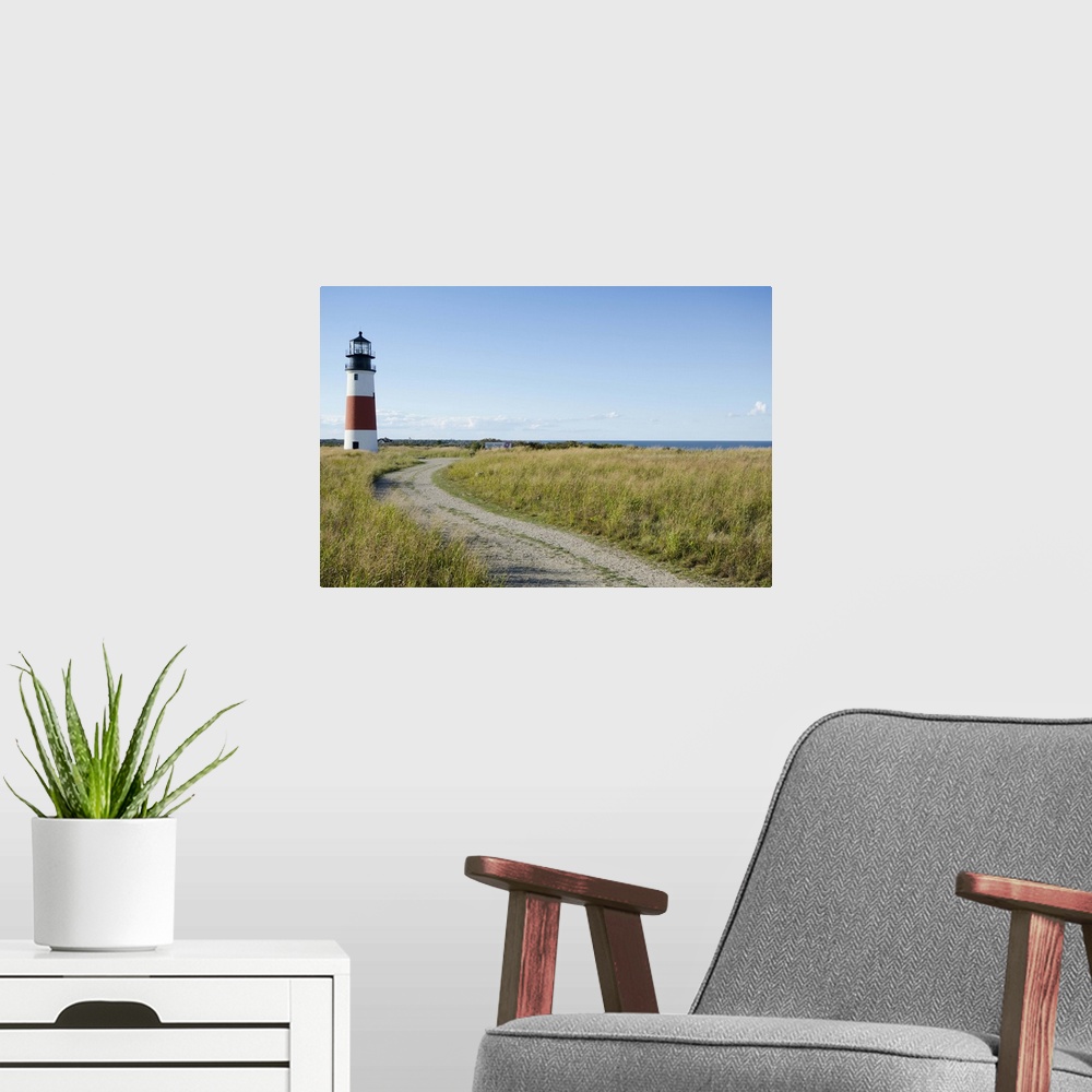 A modern room featuring Sankaty Head Lighthouse and Atlantic Ocean, Nantucket Island, Massachusetts USA.