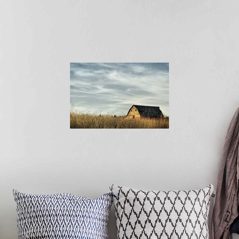 A bohemian room featuring Roof of barn in field, Canada.