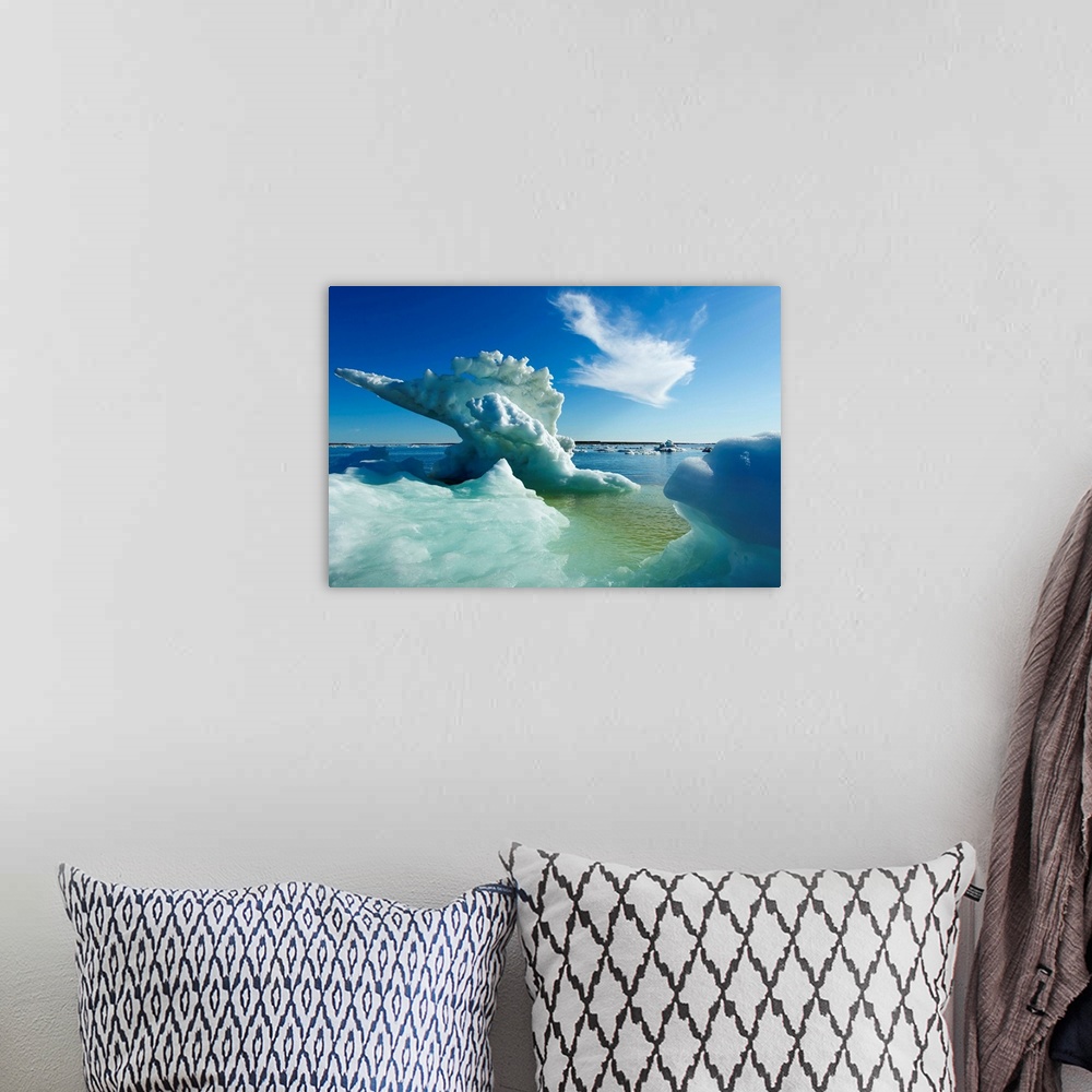 A bohemian room featuring Canada, Manitoba, Churchill, Melting sea ice and icebergs on Hudson Bay on summer evening