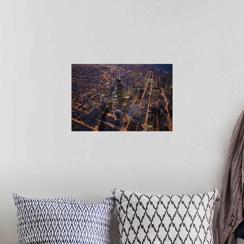 A bohemian room featuring Sears Tower and downtown from above during sunset in December with clear crisp skies. Right in th...