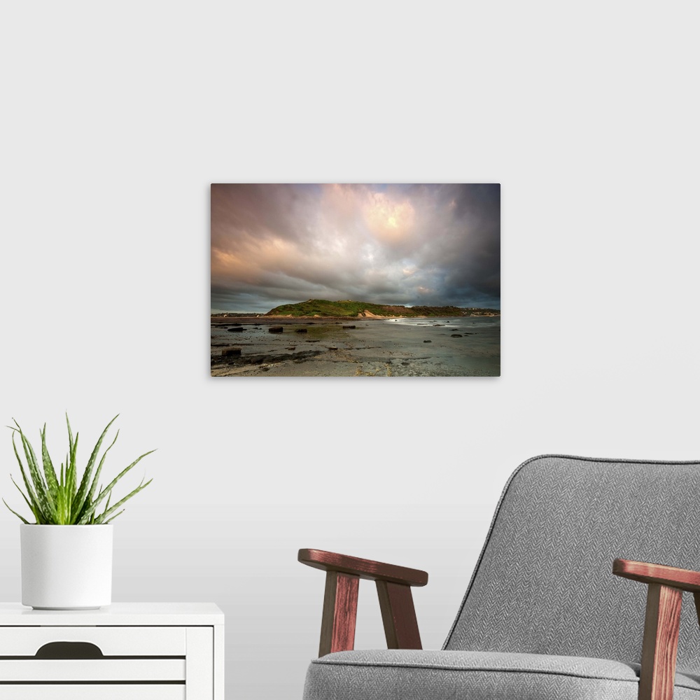 A modern room featuring Long exposure of seascape at sunrise.