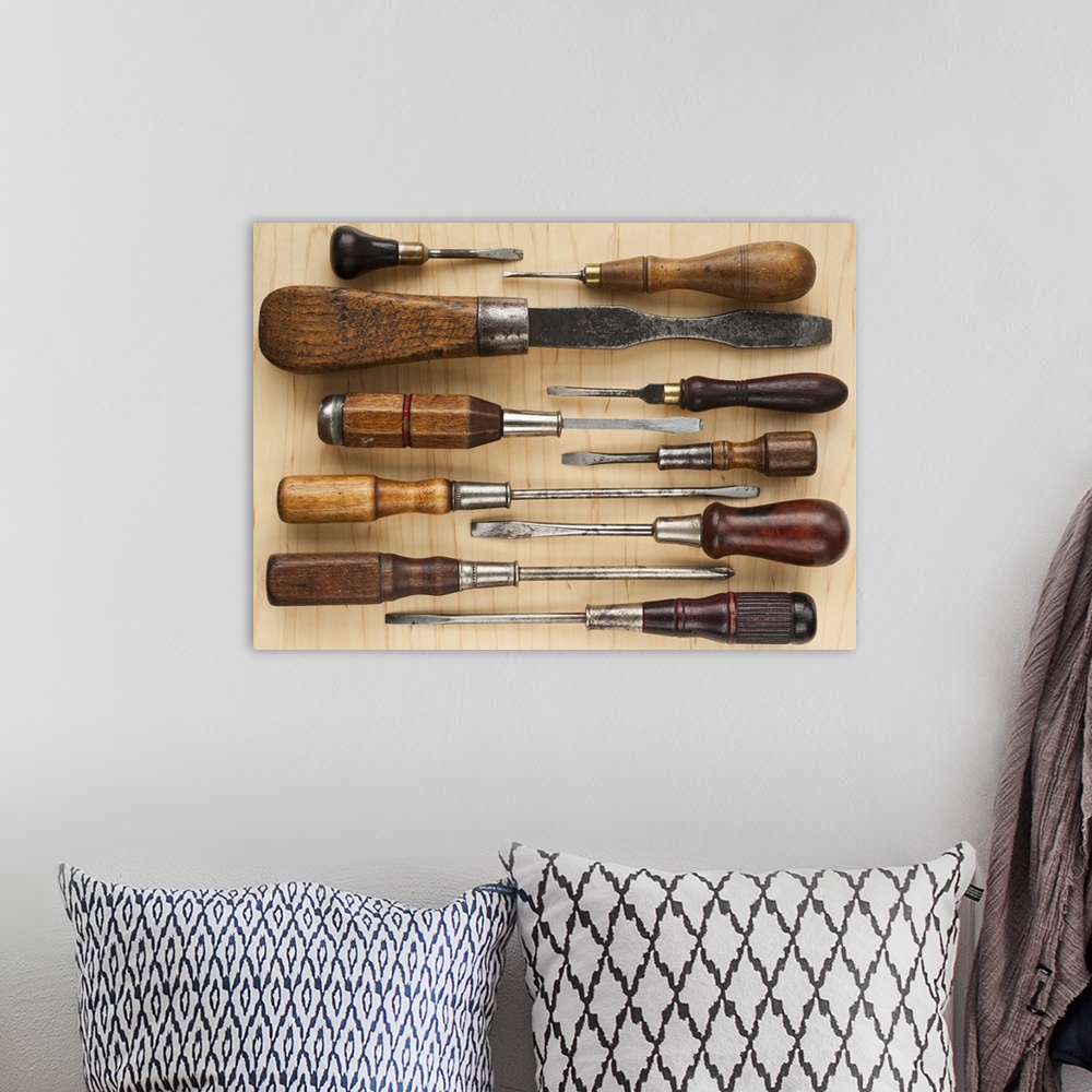 A bohemian room featuring Selection of old screwdrivers