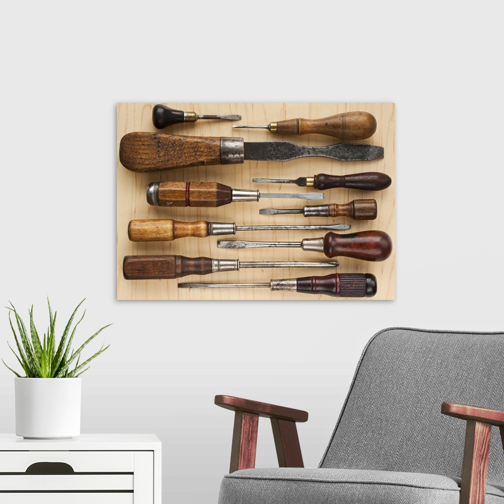 A modern room featuring Selection of old screwdrivers