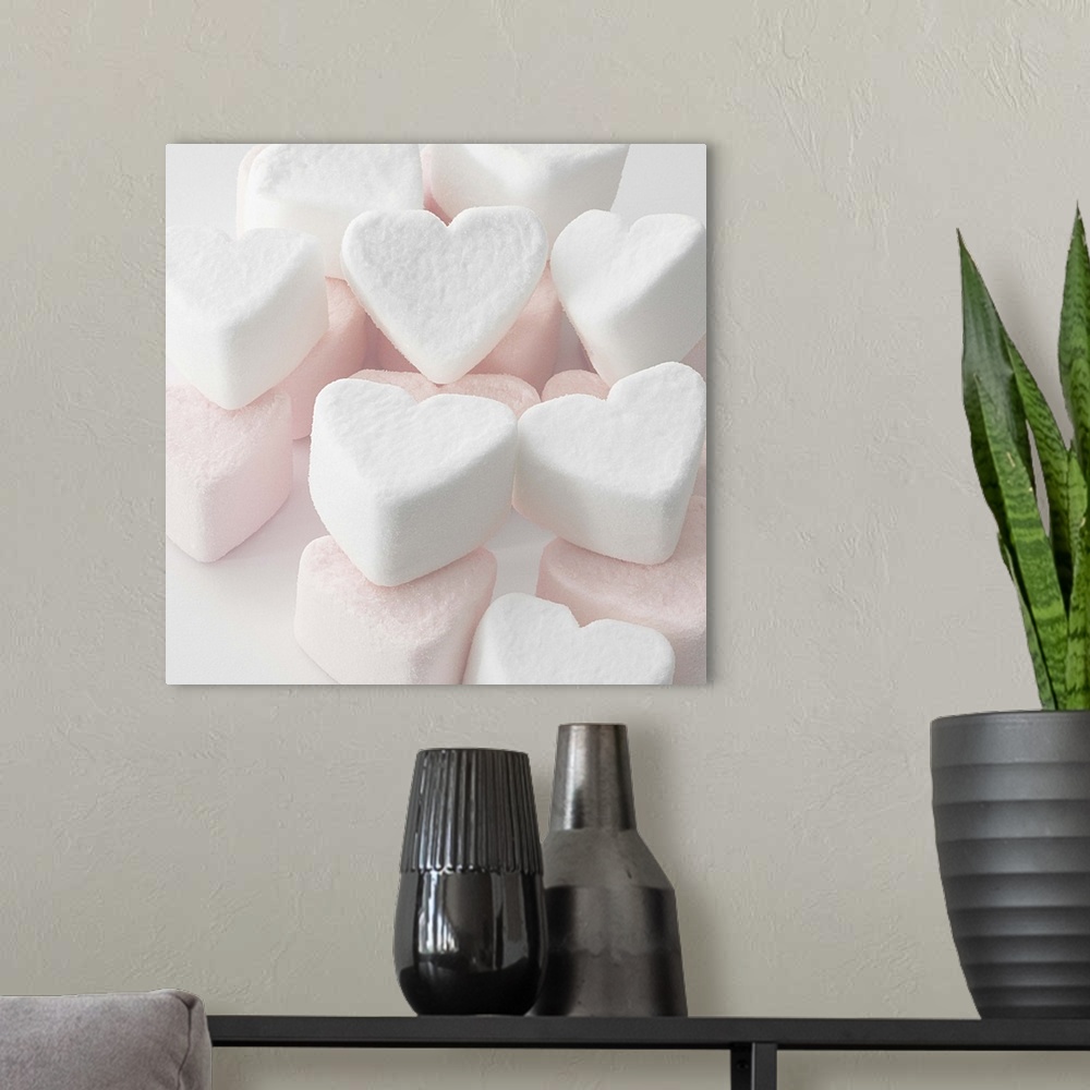 A modern room featuring Selection of pink and white heart shaped marshmallows.