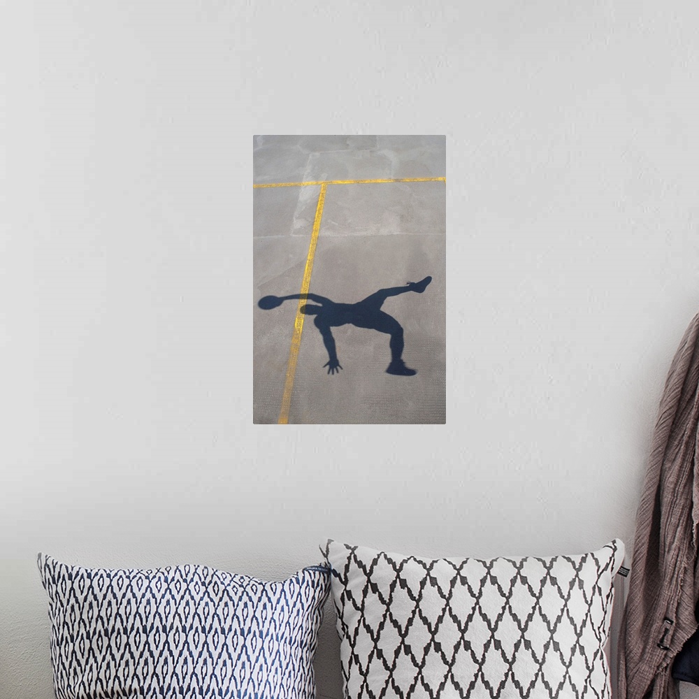 A bohemian room featuring Shadow of basketball player jumping