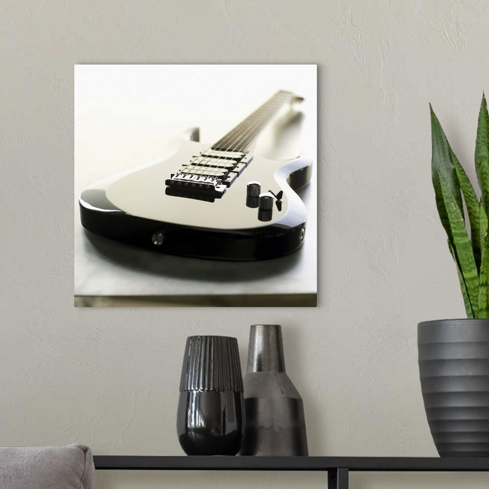 A modern room featuring Shot of an electric guitar
