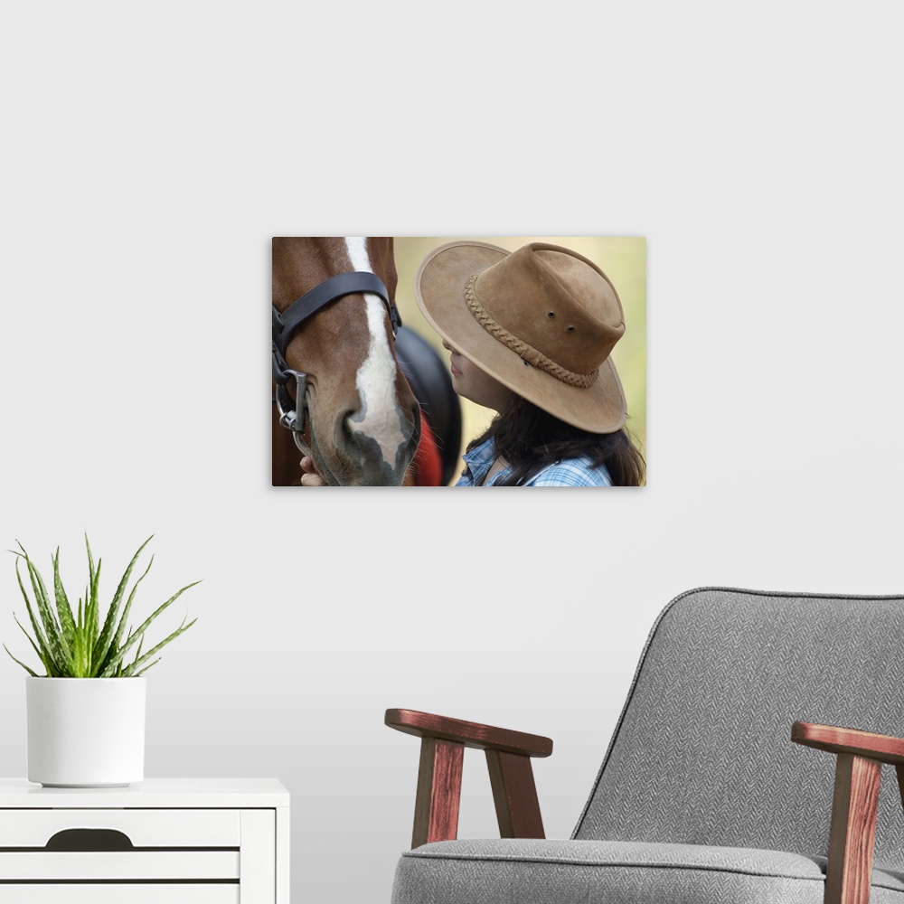 A modern room featuring Side Profile Of A Teenage Girl Touching A Horse