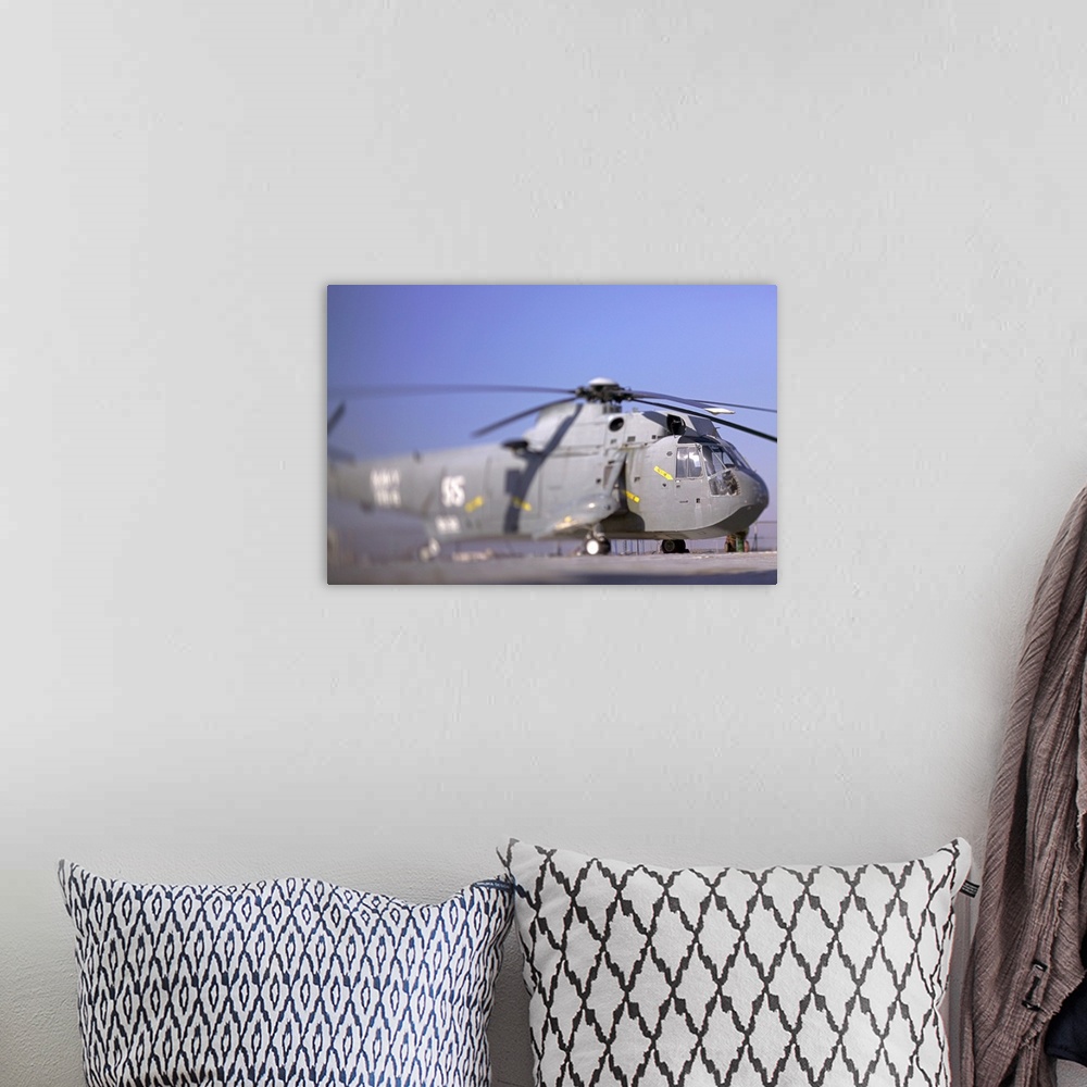 A bohemian room featuring Sikorsky SH-3 Sea King military helicopter