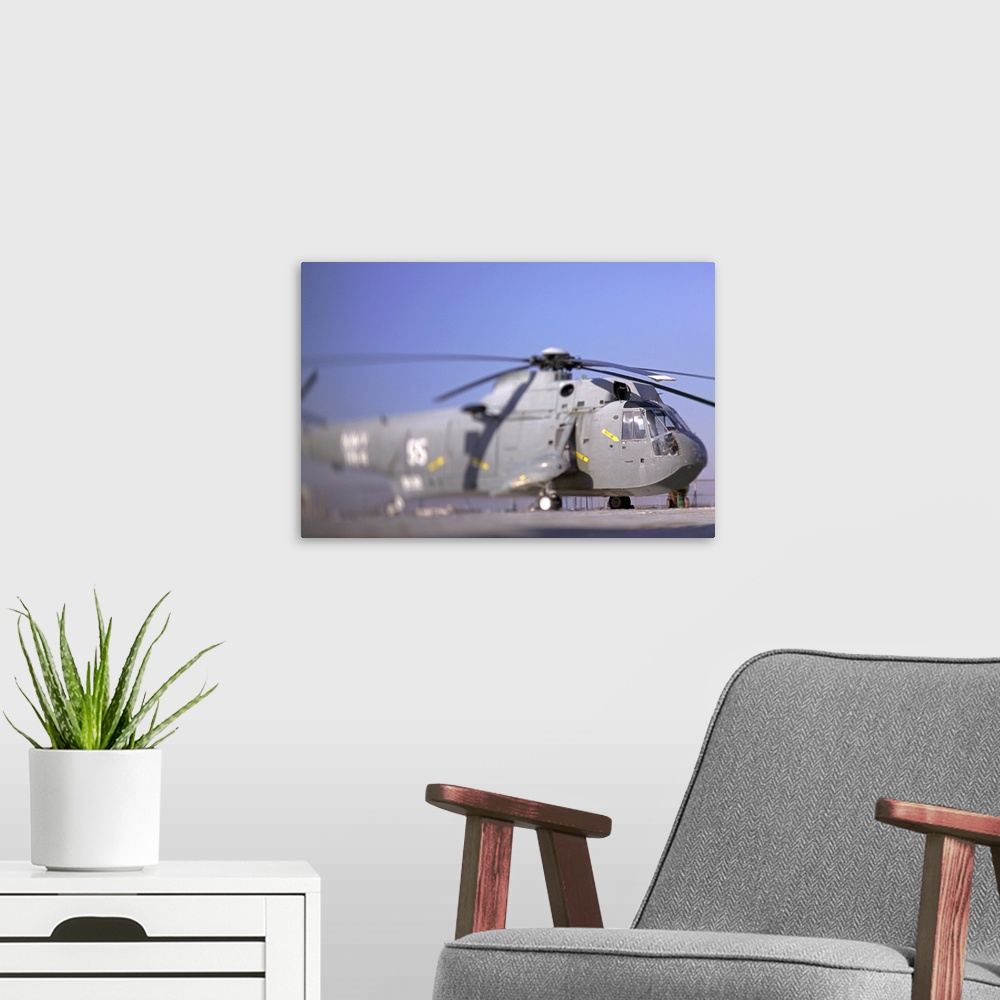 A modern room featuring Sikorsky SH-3 Sea King military helicopter