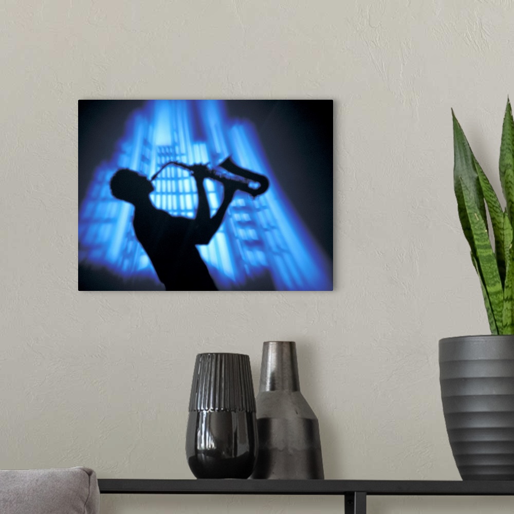 A modern room featuring Silhouette man lifting sax into air while playing