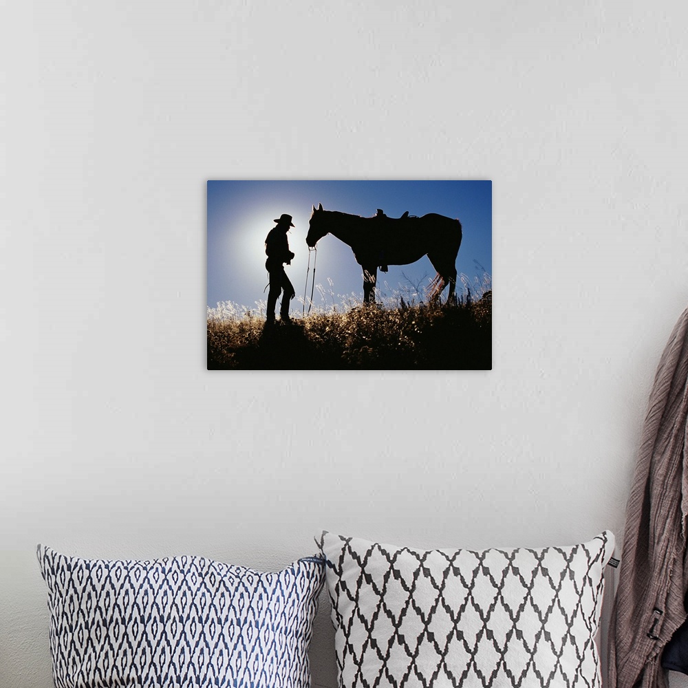 A bohemian room featuring Silhouettes Of Cowboy And Horse