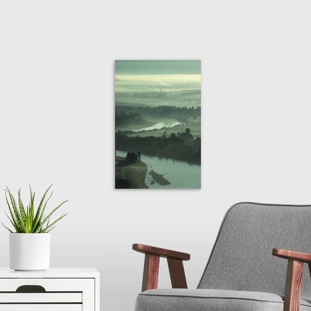 A modern room featuring Skagit Valley river with morning mist, aerial view