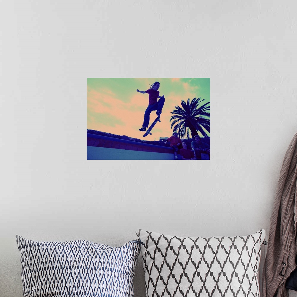 A bohemian room featuring Skateboarder in mid-air