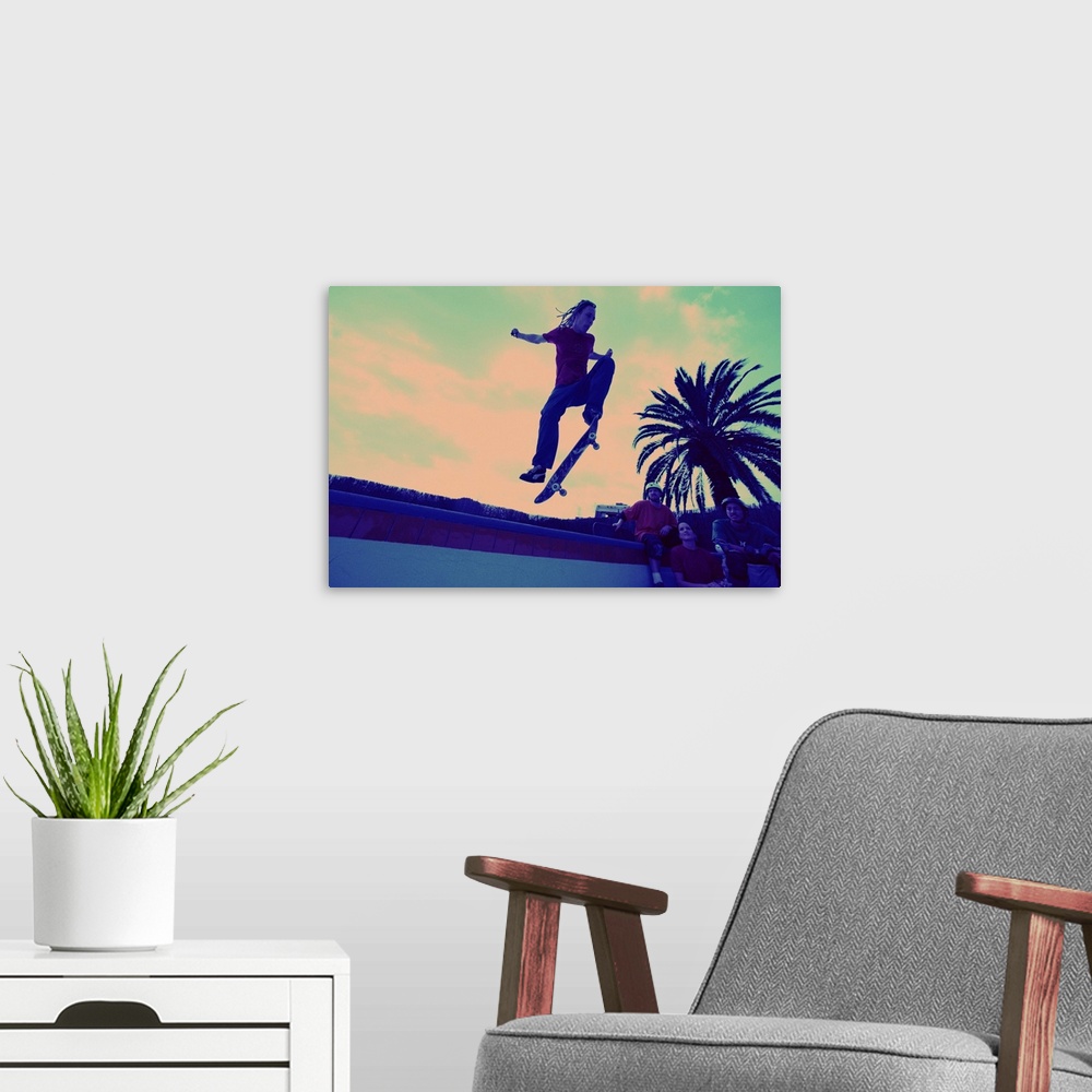 A modern room featuring Skateboarder in mid-air