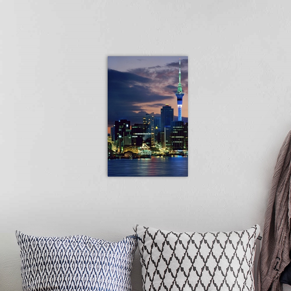 A bohemian room featuring Sky Tower and cruise ships in Auckland Harbour, North Island, New Zealand