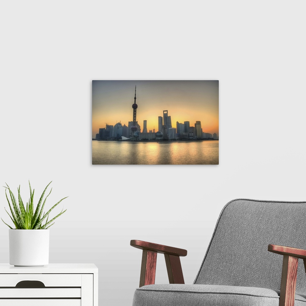 A modern room featuring Skyline in Shanghai and Bund, which is across Huangpu River from Pudong.