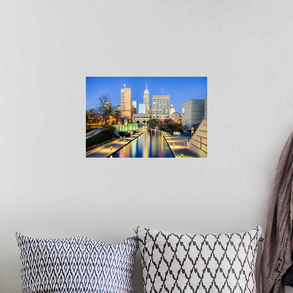 A bohemian room featuring Downtown Indianapolis reflecting on the canal.
