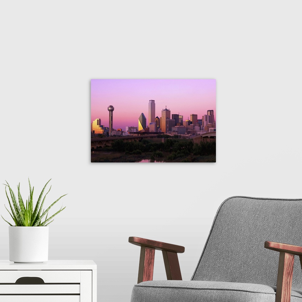 A modern room featuring USCIT083 Skyline of Dallas at dusk