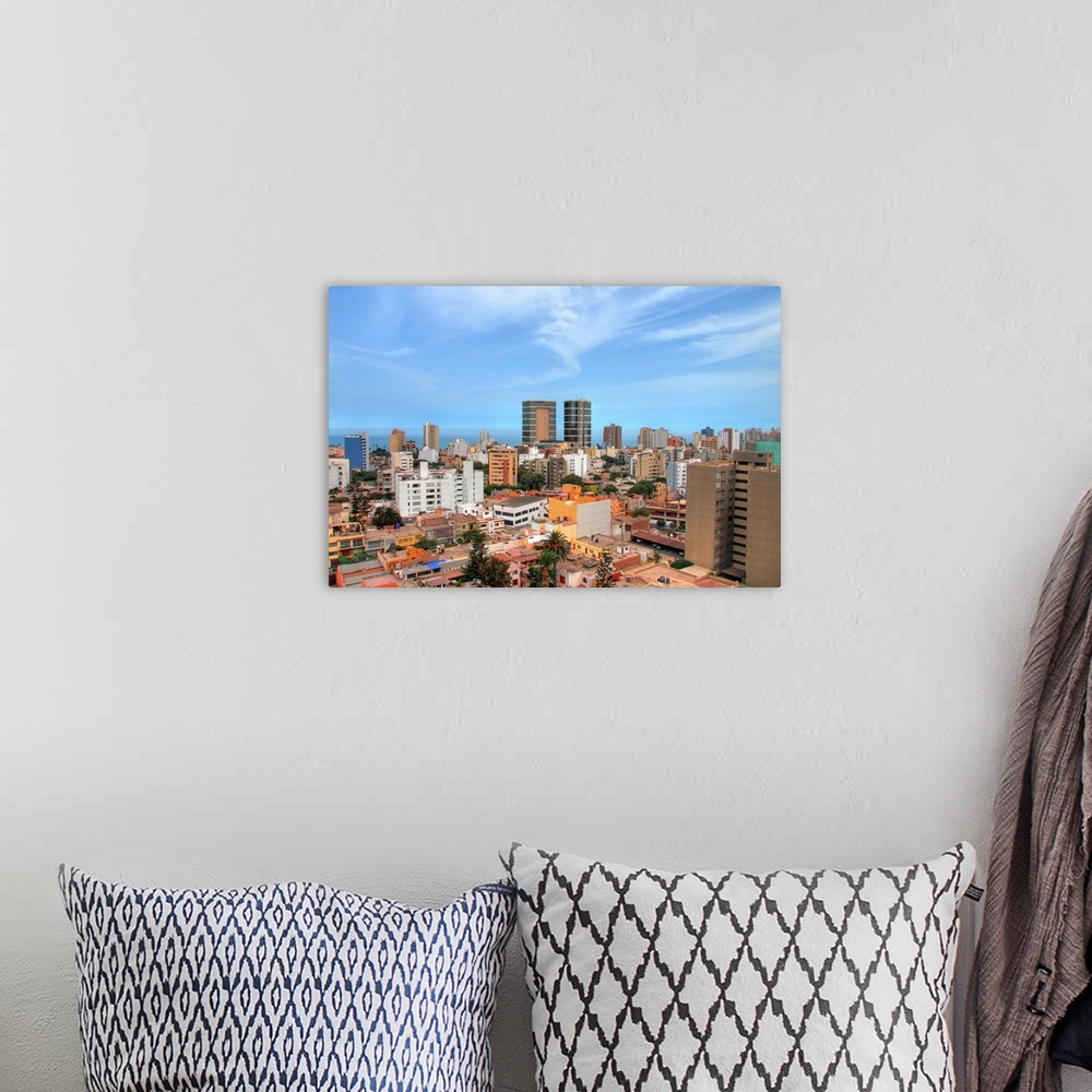 A bohemian room featuring Skyline of Miraflores district of Lima, Peru with Pacific Ocean behind