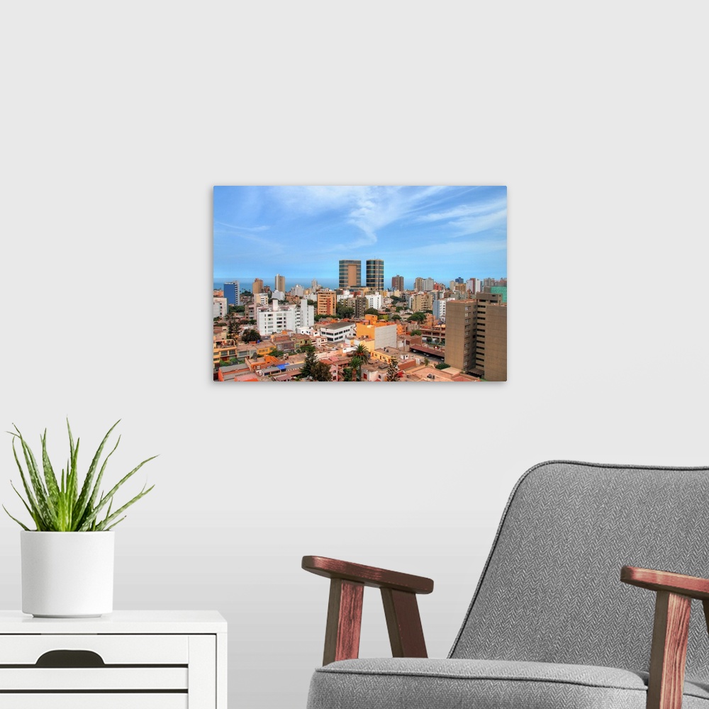 A modern room featuring Skyline of Miraflores district of Lima, Peru with Pacific Ocean behind